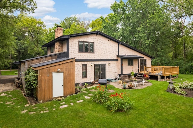 5853 Deer Trail Cir, Woodbury, MN 55129 - back of house featuring french doors, a chimney, a deck, and a lawn