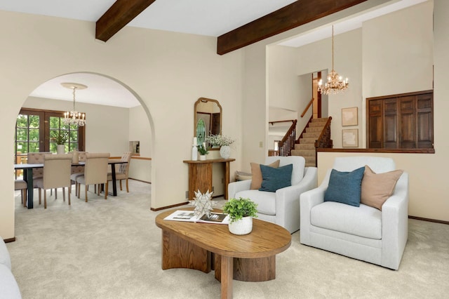 5853 Deer Trail Cir, Woodbury, MN 55129 - living room featuring a chandelier, arched walkways, carpet flooring, and beam ceiling