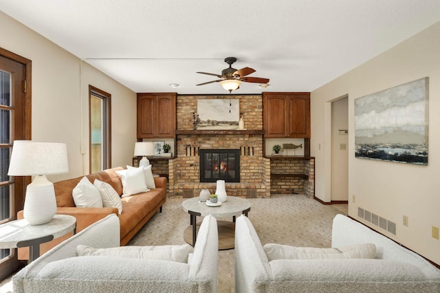 5853 Deer Trail Cir, Woodbury, MN 55129 - living room featuring a ceiling fan and a fireplace