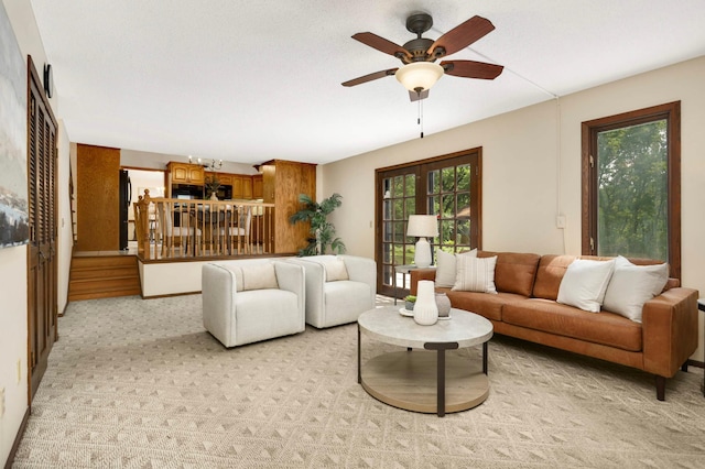 5853 Deer Trail Cir, Woodbury, MN 55129 - living room with a ceiling fan and light carpet