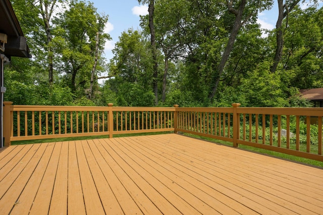 5853 Deer Trail Cir, Woodbury, MN 55129 - wooden terrace with view of wooded area