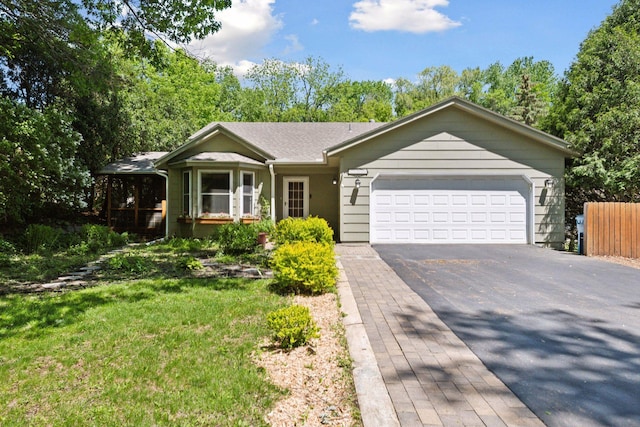 21986 Bracketts Rd, Shorewood, MN 55331 - single story home with asphalt driveway, an attached garage, and a front yard