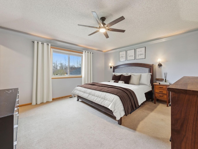 22184 Iman St NW, Nowthen, MN 55330 - bedroom featuring ornamental molding, carpet floors, a textured ceiling, a ceiling fan, and baseboards