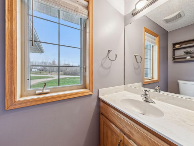 22184 Iman St NW, Nowthen, MN 55330 - bathroom with vanity and toilet