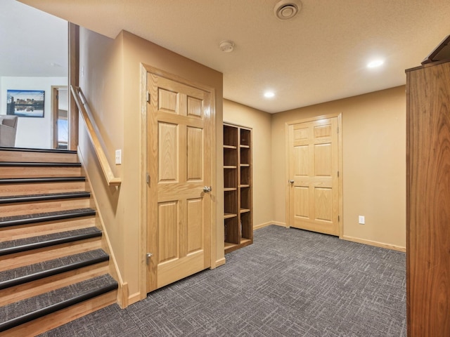 22184 Iman St NW, Nowthen, MN 55330 - basement with dark carpet, baseboards, stairway, and recessed lighting