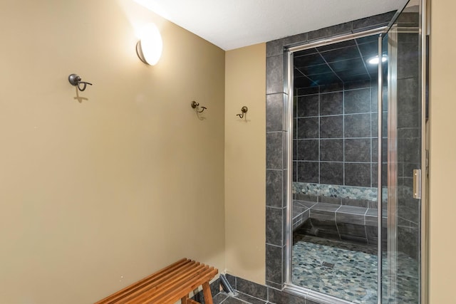 bathroom featuring a stall shower