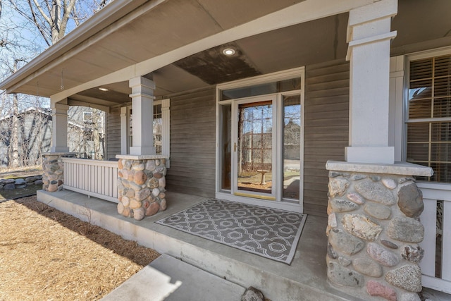 property entrance featuring covered porch