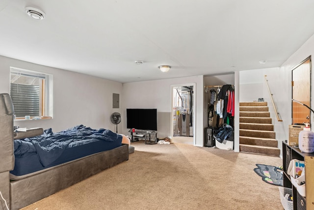 carpeted bedroom featuring electric panel