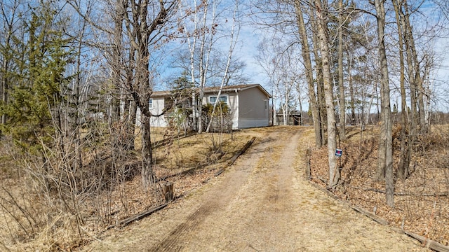 18482 Captive Lake Rd, Kathio Twp, MN 56450 - view of front of house featuring driveway