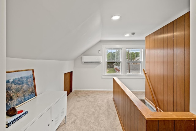 851 Watson Ave, Saint Paul, MN 55102 - bonus room featuring a wall unit AC, light colored carpet, vaulted ceiling, recessed lighting, and baseboards