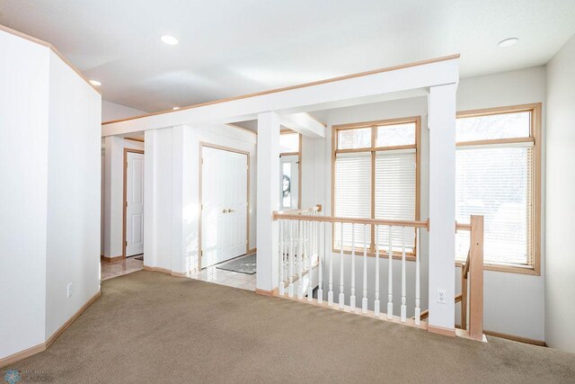 unfurnished room featuring recessed lighting, baseboards, and carpet floors