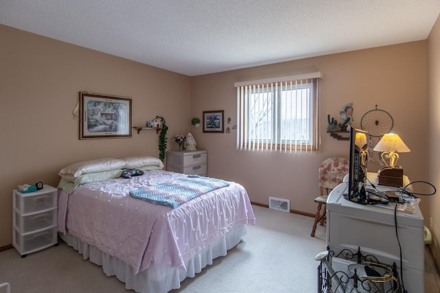 17639 Gayle Dr, Little Falls, MN 56345 - carpeted bedroom with a textured ceiling, baseboards, and visible vents