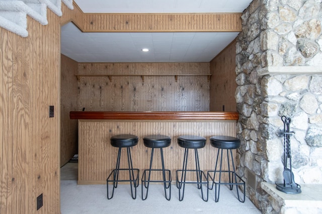 17639 Gayle Dr, Little Falls, MN 56345 - bar with carpet floors, wooden walls, and a bar