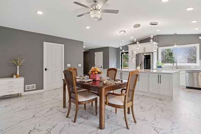 dining room featuring vaulted ceiling, recessed lighting, marble finish floor, visible vents, and a ceiling fan