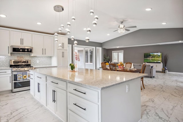 kitchen with decorative backsplash, marble finish floor, ceiling fan, and stainless steel appliances
