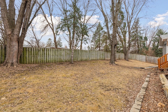 view of yard featuring a fenced backyard