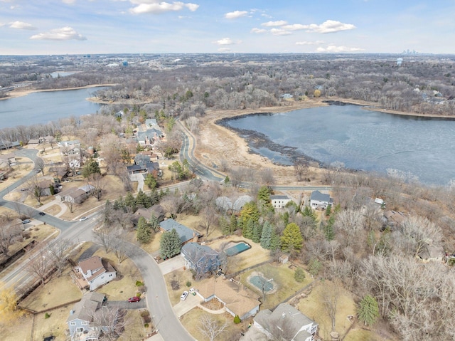 bird's eye view with a water view