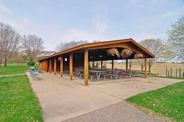view of community featuring a lawn and a gazebo