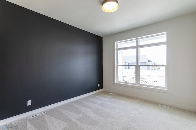 662 Rania Way W, West Fargo, ND 58078 - unfurnished room featuring light carpet and baseboards