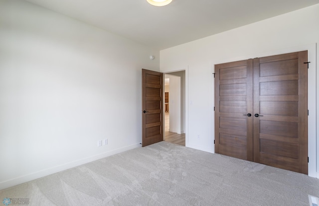 662 Rania Way W, West Fargo, ND 58078 - unfurnished bedroom featuring carpet flooring and a closet