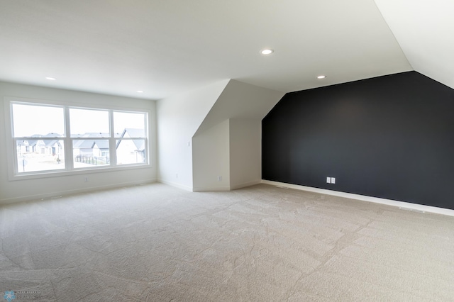 662 Rania Way W, West Fargo, ND 58078 - additional living space with recessed lighting, lofted ceiling, and light colored carpet