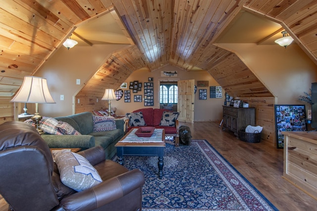 living area featuring lofted ceiling, wood finished floors, wooden walls, and wooden ceiling