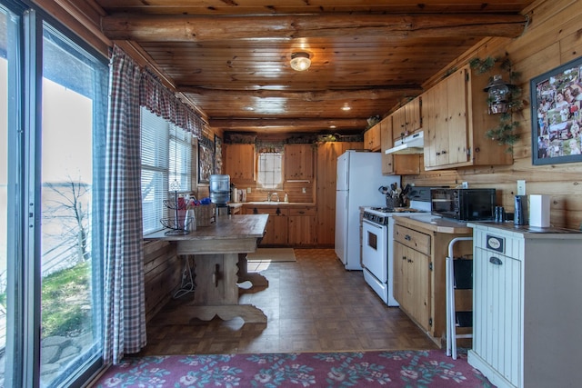 kitchen with a sink, white appliances, light countertops, under cabinet range hood, and wood ceiling