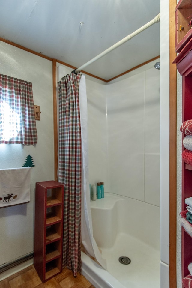 full bath featuring a shower stall