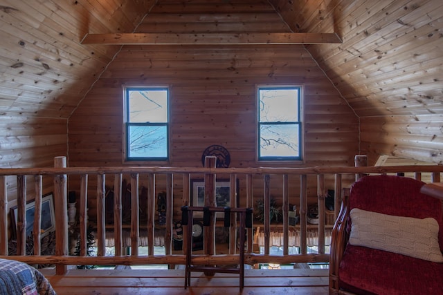 interior space featuring rustic walls, wooden ceiling, and high vaulted ceiling