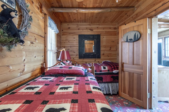 21594 452nd Pl, Aitkin, MN 56431 - carpeted bedroom featuring wood walls and wood ceiling