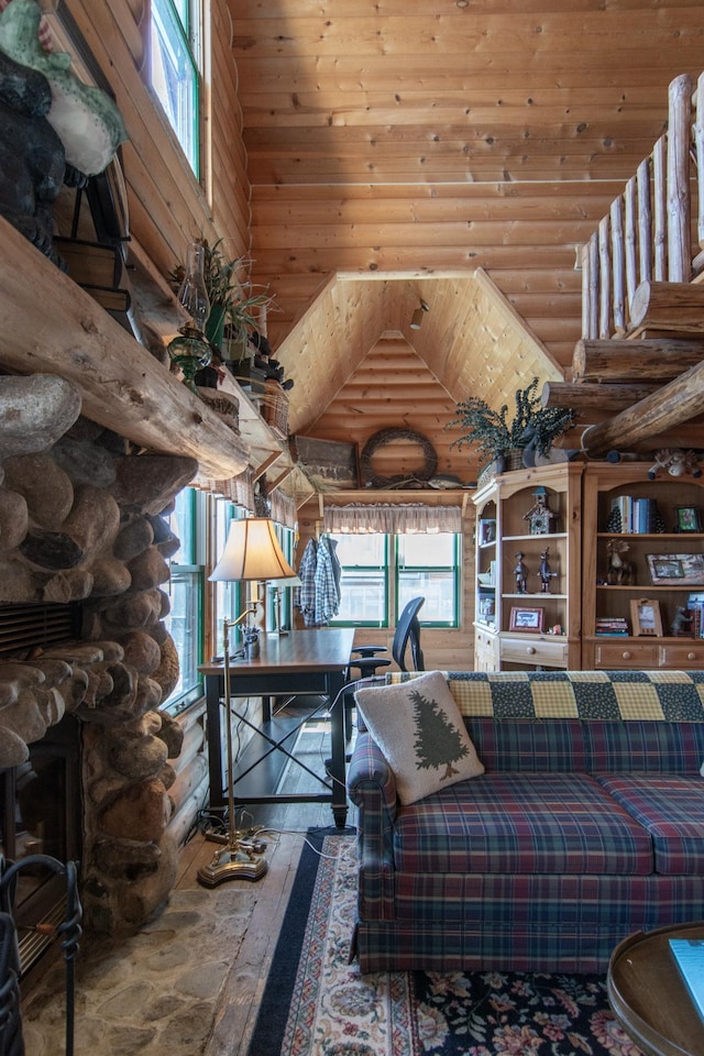 21594 452nd Pl, Aitkin, MN 56431 - living area with plenty of natural light, rustic walls, hardwood / wood-style flooring, and a high ceiling