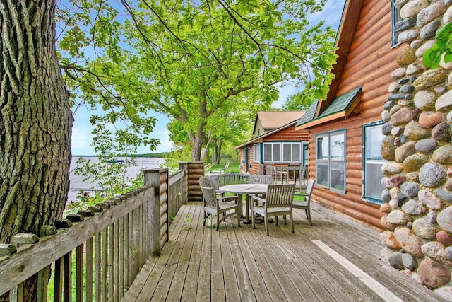 21594 452nd Pl, Aitkin, MN 56431 - wooden deck featuring outdoor dining area and a water view