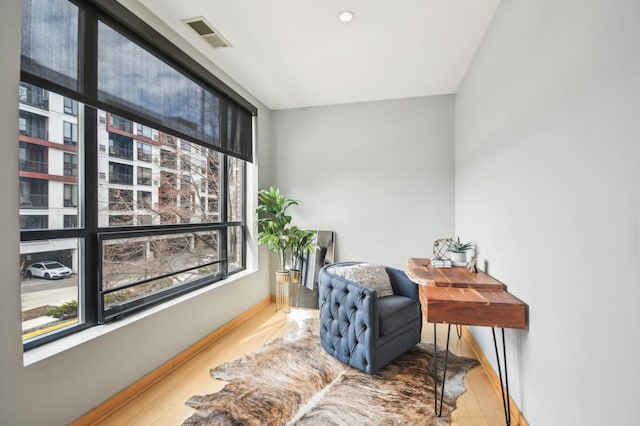 3104 Lake St Unit 202, Minneapolis, MN 55416 - sitting room featuring wood finished floors and baseboards
