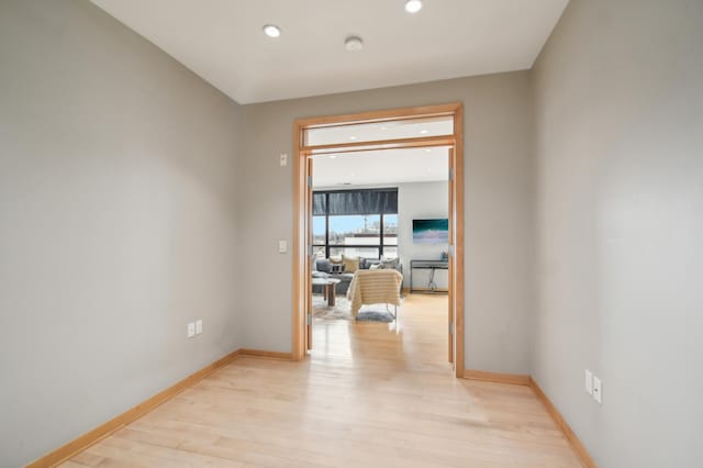 3104 Lake St Unit 202, Minneapolis, MN 55416 - hall with light wood-style flooring, recessed lighting, and baseboards