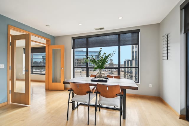 3104 Lake St Unit 202, Minneapolis, MN 55416 - dining area featuring light wood-type flooring, baseboards, and recessed lighting