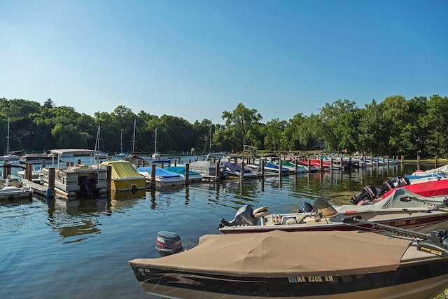 18975 Highland Ave, Deephaven, MN 55391 - dock with a water view and a wooded view
