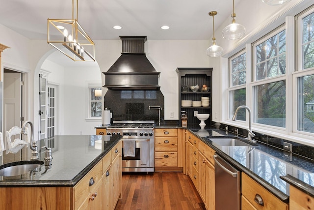 18975 Highland Ave, Deephaven, MN 55391 - kitchen featuring stainless steel appliances, a sink, premium range hood, dark wood-style floors, and recessed lighting