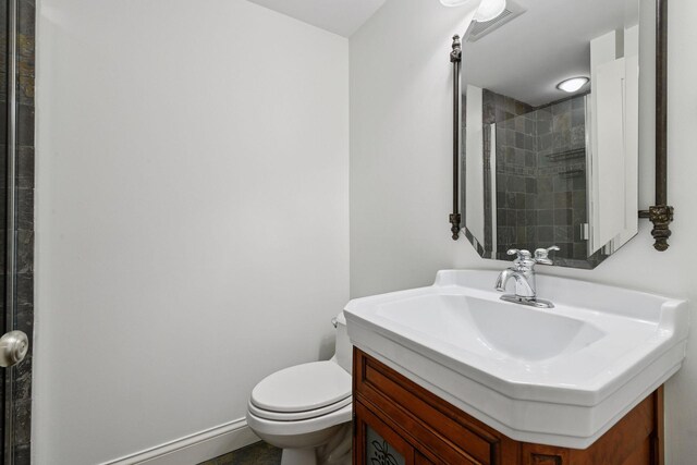 18975 Highland Ave, Deephaven, MN 55391 - full bathroom with toilet, vanity, and a tile shower