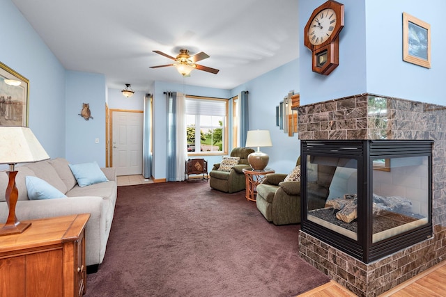 11102 16th St NE, Saint Michael, MN 55376 - carpeted living room featuring a multi sided fireplace and a ceiling fan