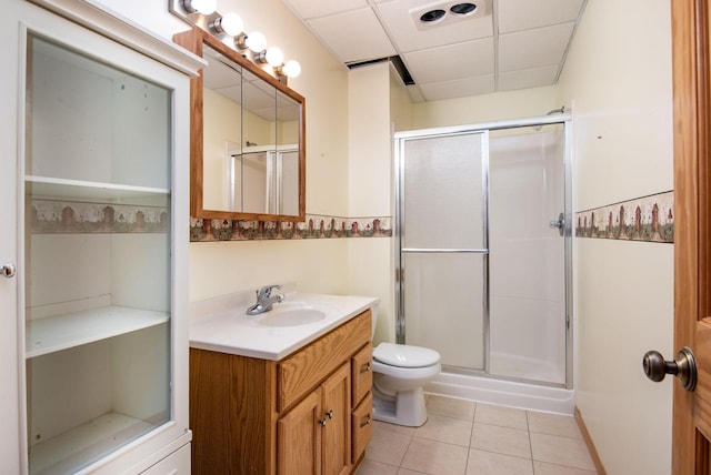 11102 16th St NE, Saint Michael, MN 55376 - bathroom with vanity, tile patterned flooring, a stall shower, and a paneled ceiling