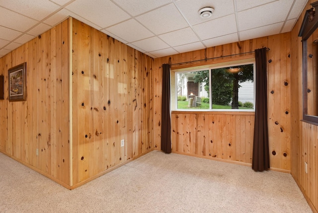 11102 16th St NE, Saint Michael, MN 55376 - carpeted spare room with wooden walls, a paneled ceiling, and a smoke detector