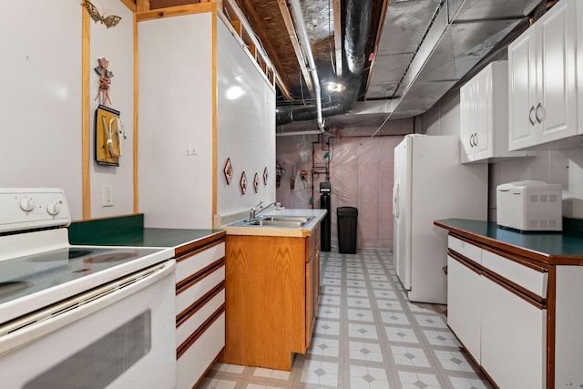 11102 16th St NE, Saint Michael, MN 55376 - kitchen featuring white appliances, light floors, and white cabinetry