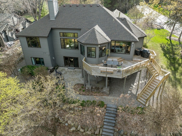 780 Virginia Shores Cir, Excelsior, MN 55331 - rear view of house featuring a wooden deck, a chimney, roof with shingles, stairway, and cooling unit