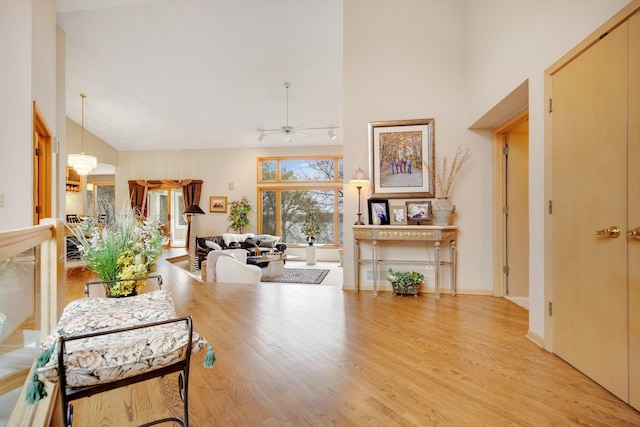 780 Virginia Shores Cir, Excelsior, MN 55331 - living room featuring high vaulted ceiling, wood finished floors, and a ceiling fan