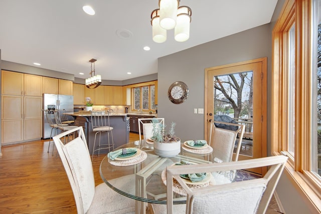 780 Virginia Shores Cir, Excelsior, MN 55331 - dining room featuring a chandelier, light wood-style flooring, and recessed lighting