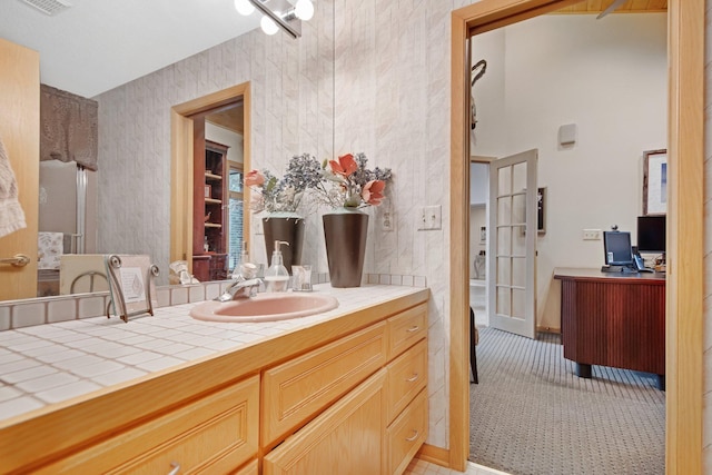 780 Virginia Shores Cir, Excelsior, MN 55331 - bathroom featuring vanity and baseboards