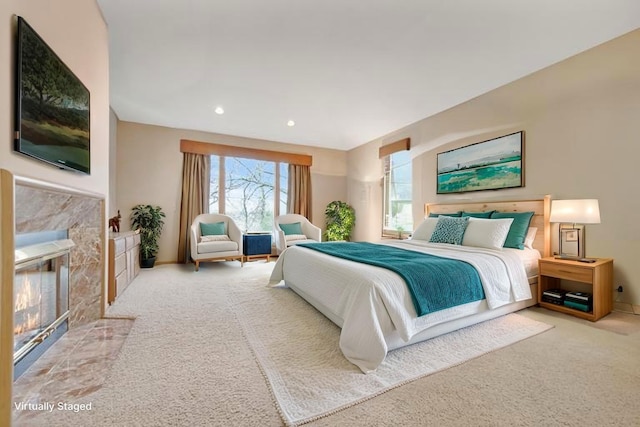 780 Virginia Shores Cir, Excelsior, MN 55331 - carpeted bedroom featuring a premium fireplace and recessed lighting