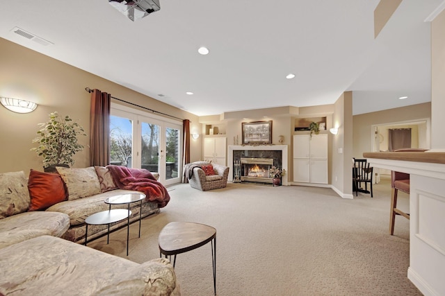 780 Virginia Shores Cir, Excelsior, MN 55331 - living room featuring light colored carpet, a tiled fireplace, baseboards, and recessed lighting