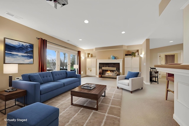 780 Virginia Shores Cir, Excelsior, MN 55331 - carpeted living room with a fireplace, baseboards, and recessed lighting