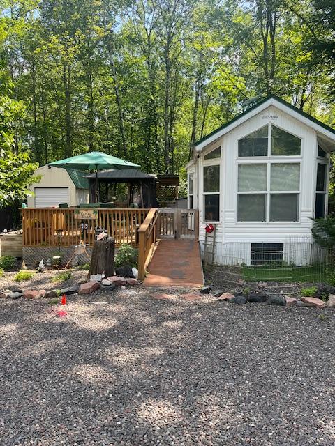 view of yard with a wooden deck
